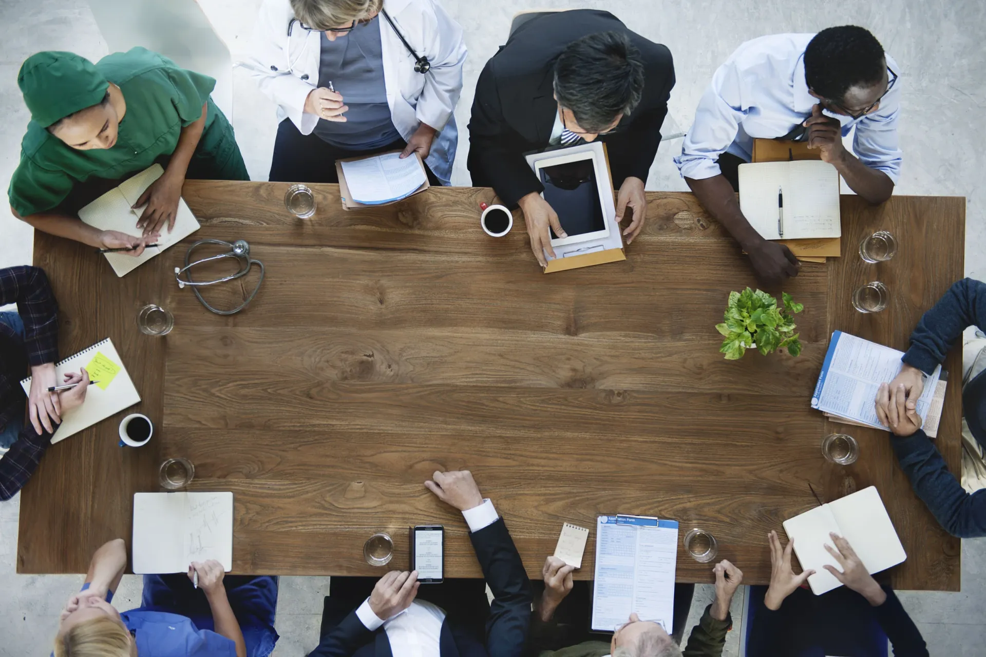 52314670 - doctor meeting teamwork diagnosis healthcare concept Team collaborating at table