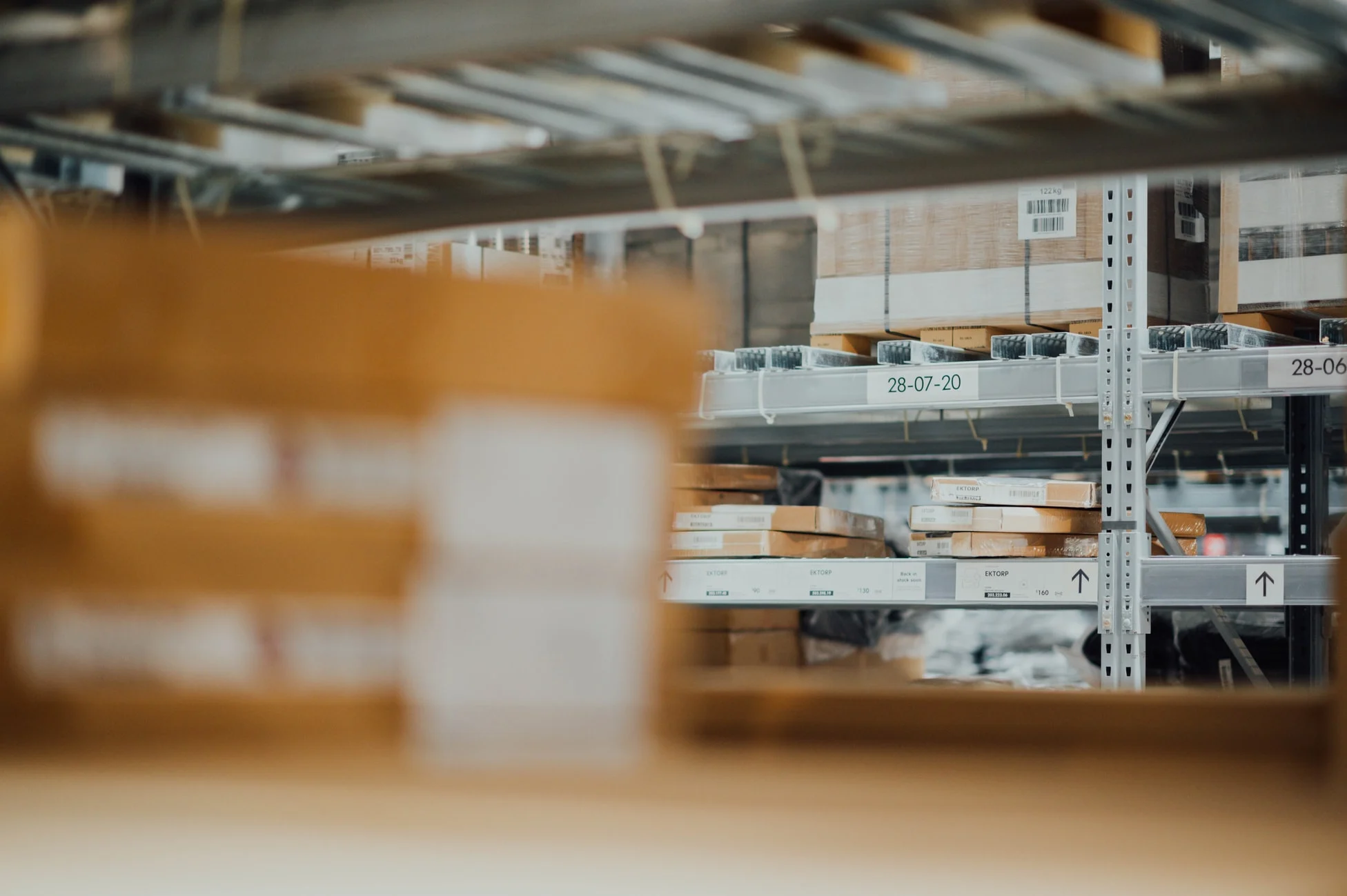 Incito-lean-supply-chain Labeled inventory boxes in warehouse storage