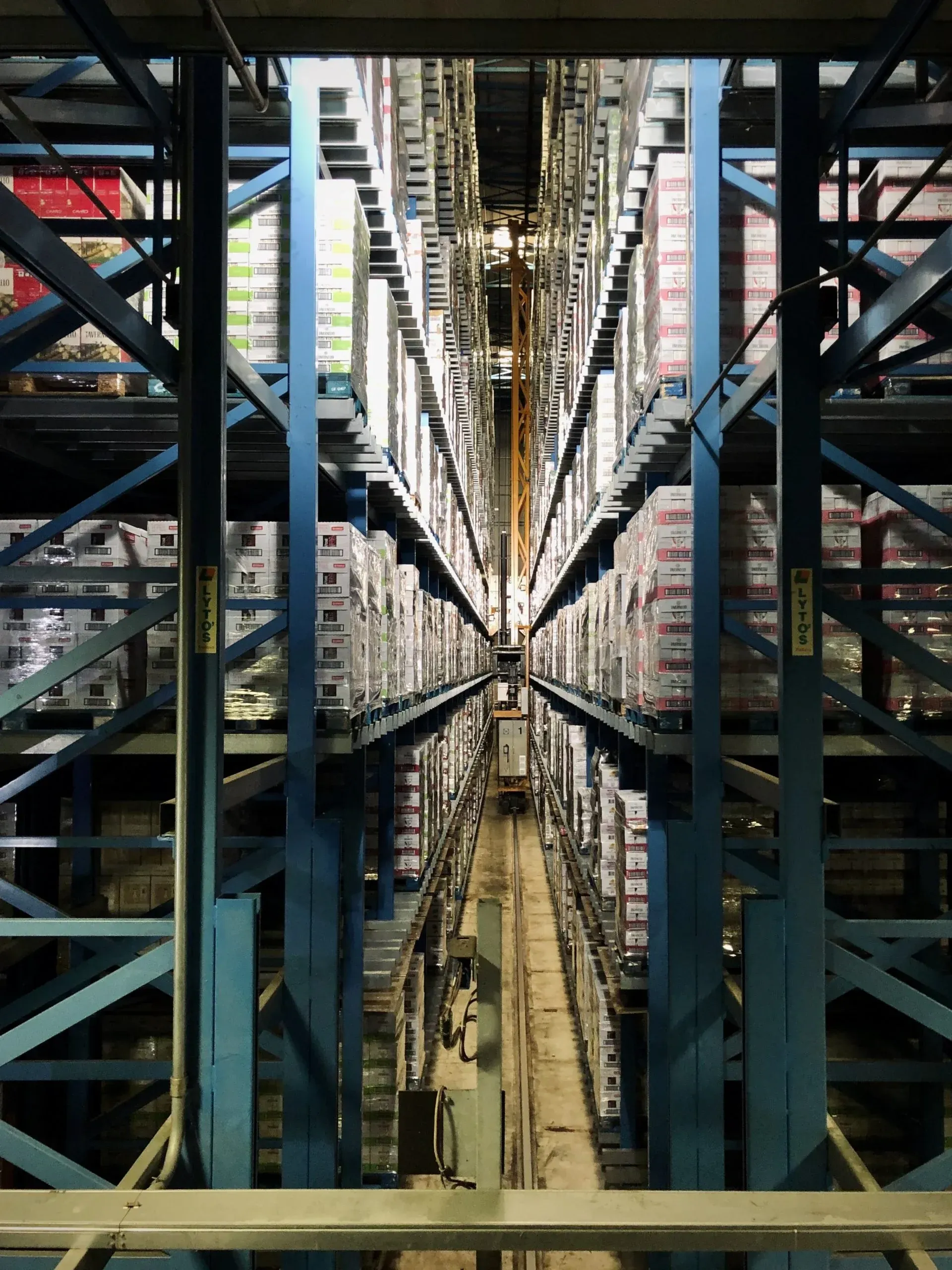 Tall warehouse racks filled with inventory